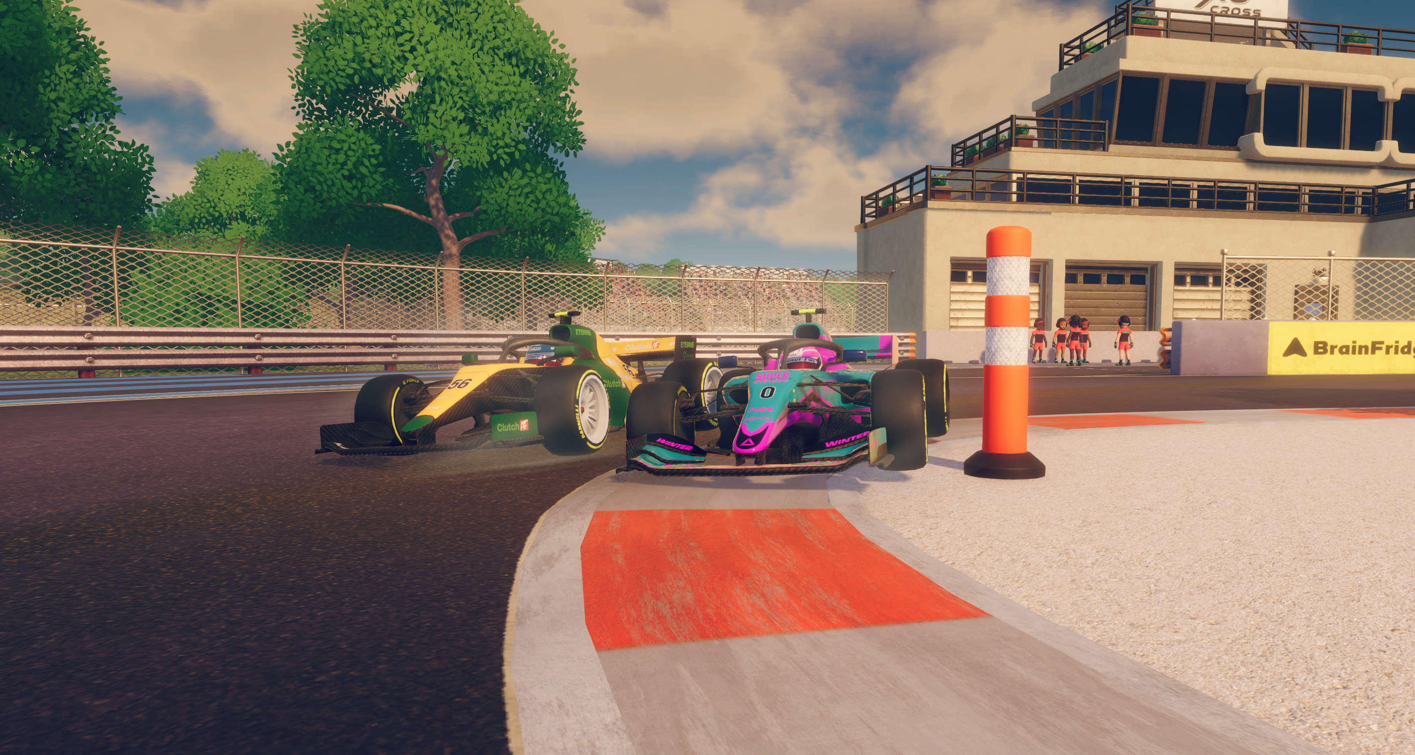 Open-wheel cars battling through a corner