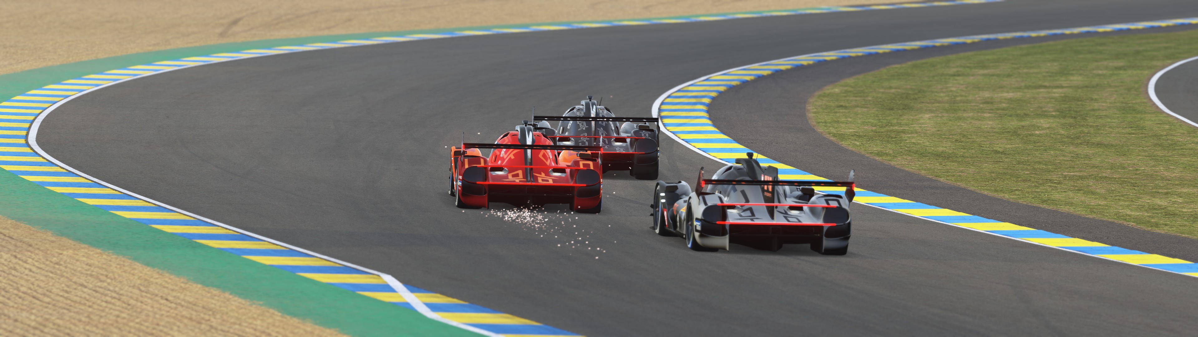 Rear view of black and orange Genesis GMR-001 Hypercars racing through the corners in Le Mans Ultimate