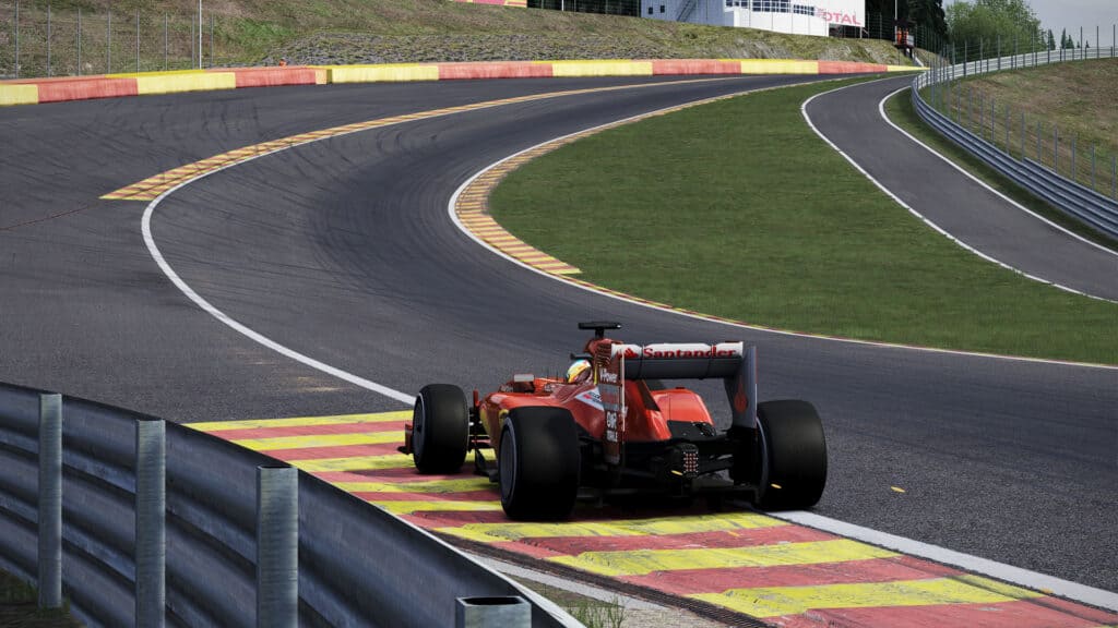 Modern-day Ferrari F1 action at Spa. On a sunny day. That’s how you can tell this isn’t real-life.