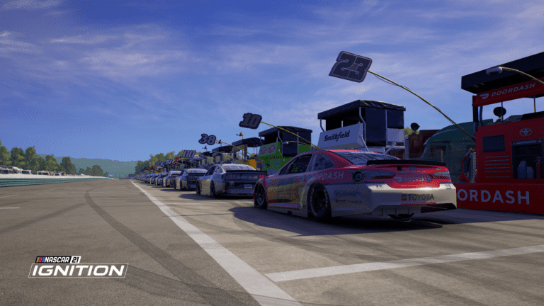 Bubba Wallace's No. 23 and others sit on pit road in NASCAR 21: Ignition