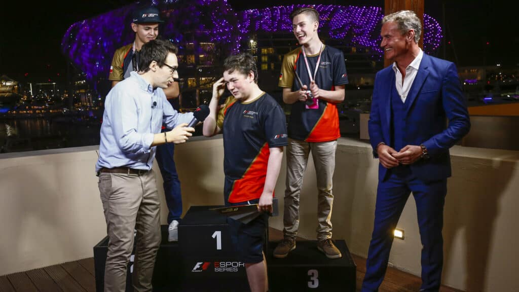 Brendon Leigh celebrates on the podium after winning the2017 F1 Esports event, World Copyright Andrew Hone and LAT Images, Motorsport images