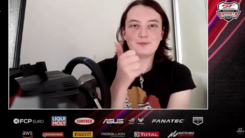 Mia Rose gives the thumbs up while taking part in the 2020 GT World Challenge Esports Championship