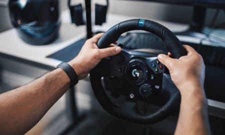 Sponsored - Why you should use a steering wheel for sim racing