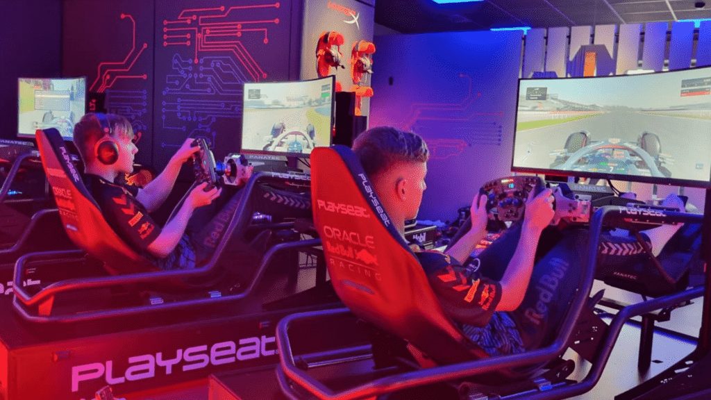 Tom and Jed side-by-side in sims at the Oracle Red Bull Racing Esports facility