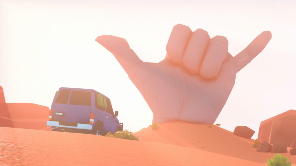 Over the Hill review screenshot showing a sculpted rock hand